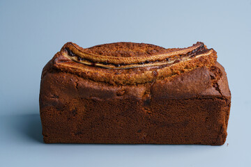 Banana bread loaf on a blue background