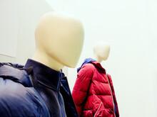 White Male Abstract Mannequins In Padded Quilted Winter Jackets