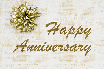 Wall Mural - Happy Anniversary greeting with bow on grunge white and gold