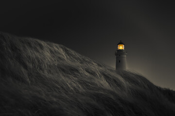 Wall Mural - View of Hirtshals Lighthouse on dark gray background. Denmark.