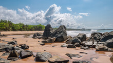 Black Dark Boulders Lying On A Beach After The Coast In Axim Ghana West Africa