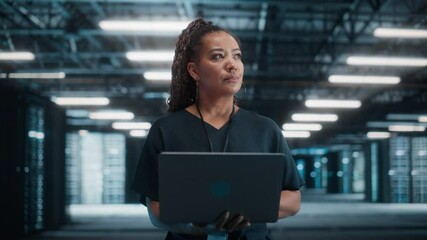 Poster - Concept Dolly Zoom Out: Portrait of Black Female Specialist Using Laptop in Big Data Center. Cinematic Shot with High-Tech Special Effect for Technology Science Breakethrough, Progress, Innovation