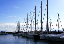 Masts Of Luxury Yachts Anchored In The Dock