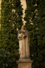 Poster - Old statue in the historical town of Kamianets-Podilskyi in Ukraine