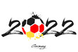Numbers 2022 and a abstract soccer ball painted in the colors of the Germany flag. 2022 and flag of Germany in the form of a soccer ball made of blots. Vector illustration on isolated background
