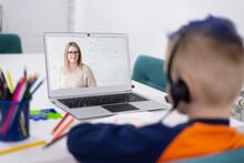 Remote Learning Concept With Boy Using Laptop. Little Boys Attending To Online School Class.