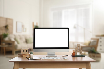 Workplace with modern computer on wooden table indoors. Mockup for design
