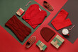 Set of children's clothes with Christmas gifts on color background