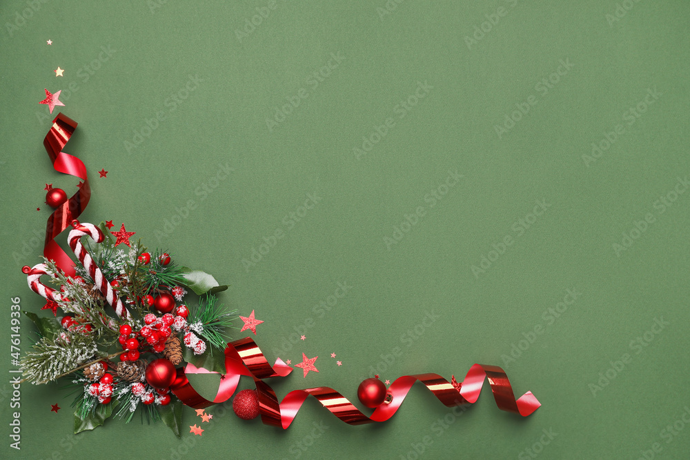 Beautiful Christmas composition with decor on green background