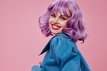 Positive young woman wavy purple hair blue jacket emotions fun studio model unaltered