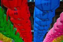 Close-up Shot Of Colorful Paper Lanterns Hanging In A Street In South Korea.