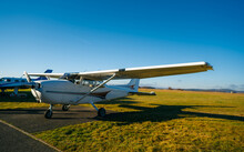 Small Sport Airplane Cessna 150 On Standing On A Runway.Single-engine Turboprop Airplane