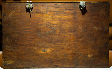 The Texture Of The Old Wood Is Brown. An Old Wooden Box, A Place For Text.Antique Wooden Box.