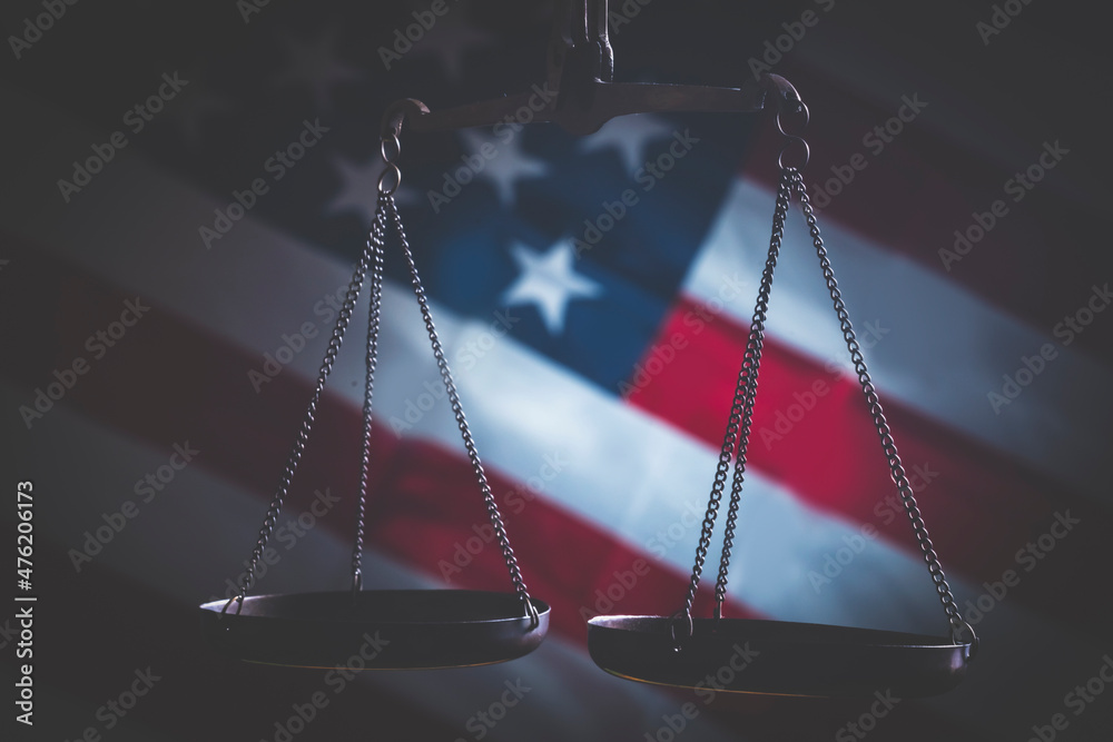 Freedom Scale Conceptual image of scale of Justice against American flag background ...