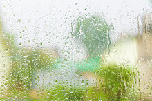 Rainy Weather Background. Rain Drops On The Window. Forecast Concept