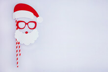 Christmas Santa Mask From Paper On A White Background. Festive Props