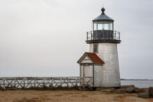 Brant Point Lighthouse Over The Beach With Guardrails In Nantucket, Massachusetts