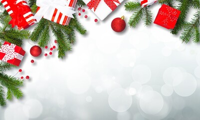 Poster - Christmas mood border of gifts, green fir, gold decorations on background.