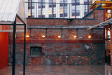 Fototapeta  - Red brick wall in the center of Design, old factory wall