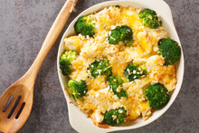 Broccoli Chicken Divan Is A Creamy Casserole Topped With Crispy Buttered Breadcrumbs Close Up In The Dish On The Old Table. Horizontal Top View From Above