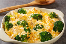 Chicken Divan Is A Type Of Chicken And Broccoli Casserole With A Creamy Sauce Close Up In The Dish On The Old Table. Horizontal