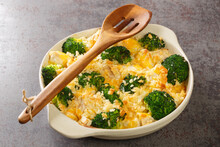 Broccoli Chicken Divan Is A Creamy Casserole Topped With Crispy Buttered Breadcrumbs Close Up In The Dish On The Old Table. Horizontal