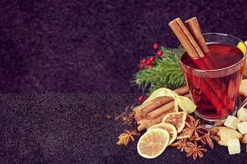 Canvas Print - Christmas or New Year hot winter drink, spicy grog cocktail, punch or mulled wine with tea,