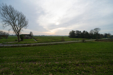 Wall Mural - Countryside landscape with farmhouse in autumn