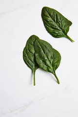 Wall Mural - Top view of organic spinach leaves