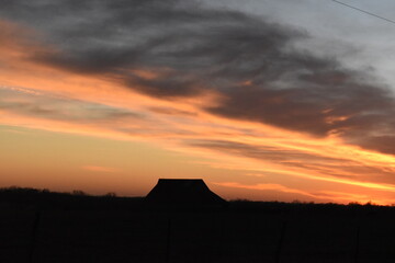 Canvas Print - Sunset Over a Barn