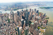Aerial panoramic city view of Lower Manhattan district towards Downtown, New York City, USA. Bird's eye view from helicopter of metropolis cityscape. A vibrant business neighborhood