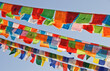 Colorful Tibetan prayer flags flutter at Boudhanath, a sacred Tibetan Buddhist stupa in the Kathmandu Valley, Nepal