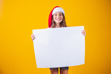 Happy Little Girl At Christmas With A Blank Empty White Poster