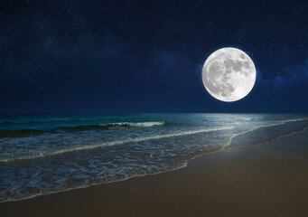 full moon over the sea with tropical beach. (elements of the moon image furnished by nasa)