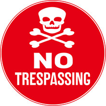 Circular Sign In Red Color That Warns : No Trespassing