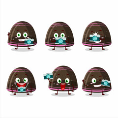 Wall Mural - Photographer profession emoticon with chocolate jelly gummy candy cartoon character