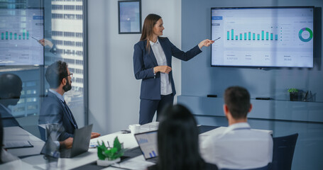 Poster - Diverse Office Conference Room Meeting: Motivated Female Digital Startup Owner Presents e-Commerce Fintech Growth Statistics to a Group of Investors. Wall TV with Big Data Analysis, Infographics