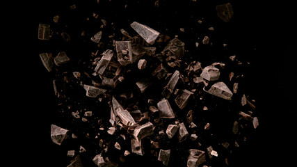 Aufkleber - Freeze motion of flying group of raw chocolate pieces.