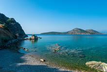 Rocky Coast Of Greek Island And Sea View, Landscape Greece
