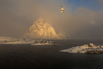 Epic sunrise over a Norwegian village. View from above. Scandnavian life.