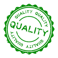 Sticker - Grunge green quality word round rubber seal stamp on white background