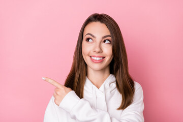 Wall Mural - Photo of charming young positive woman look point finger empty space sale isolated on pink color background