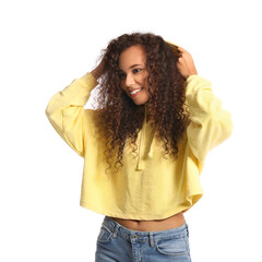 Wall Mural - Beautiful young African-American woman in stylish hoodie on white background