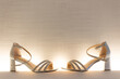 bride wedding shoes with dramatic lighting 