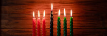 Celebration Of African American Kwanzaa Festival. Seven Burning Candles In Kinara Candlestick.