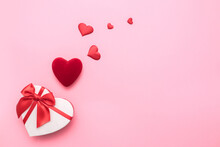 Love Valentine's Day. Love Background. Gifts In The Form Of Hearts On A Pink Background With The Inscription Love. Copy Space For Text. The Concept Of Romance And Love. Square Format. Word