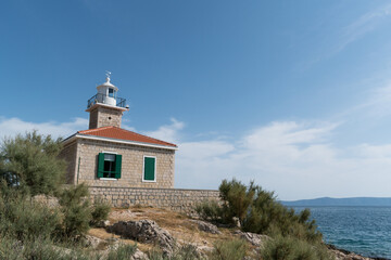 Lighthouse St. Peter on the St. Peter peninsula in Makarska, Dalmatia, Croatia during summer