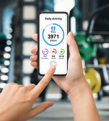 Poster - Cropped of woman checking daily activity while exercising at gym