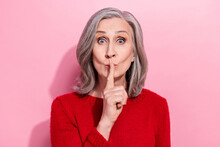 Portrait Of Attractive Trendy Elderly Gray-haired Woman Showing Shh Sign Isolated Over Pink Pastel Color Background