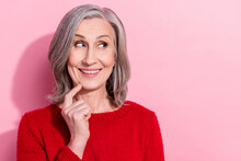Portrait Of Attractive Curious Cheerful Gray-haired Woman Creating Solution Copy Space Isolated Over Pink Pastel Color Background